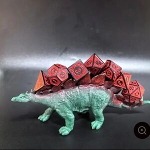 Stegosaurus Dice Holder with Red Dice